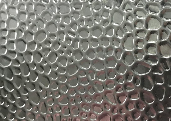 Aluminijasta reliefna tuljava